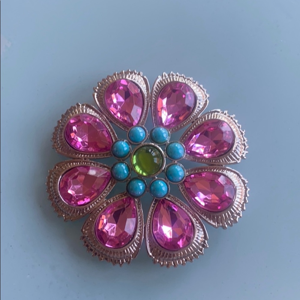 Silver brooch with vivid colorful stones